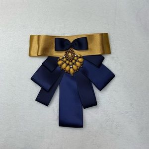 Navy blue and yellow brooch